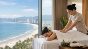Professional full-body massage in a Da Nang hotel room with a coastal view